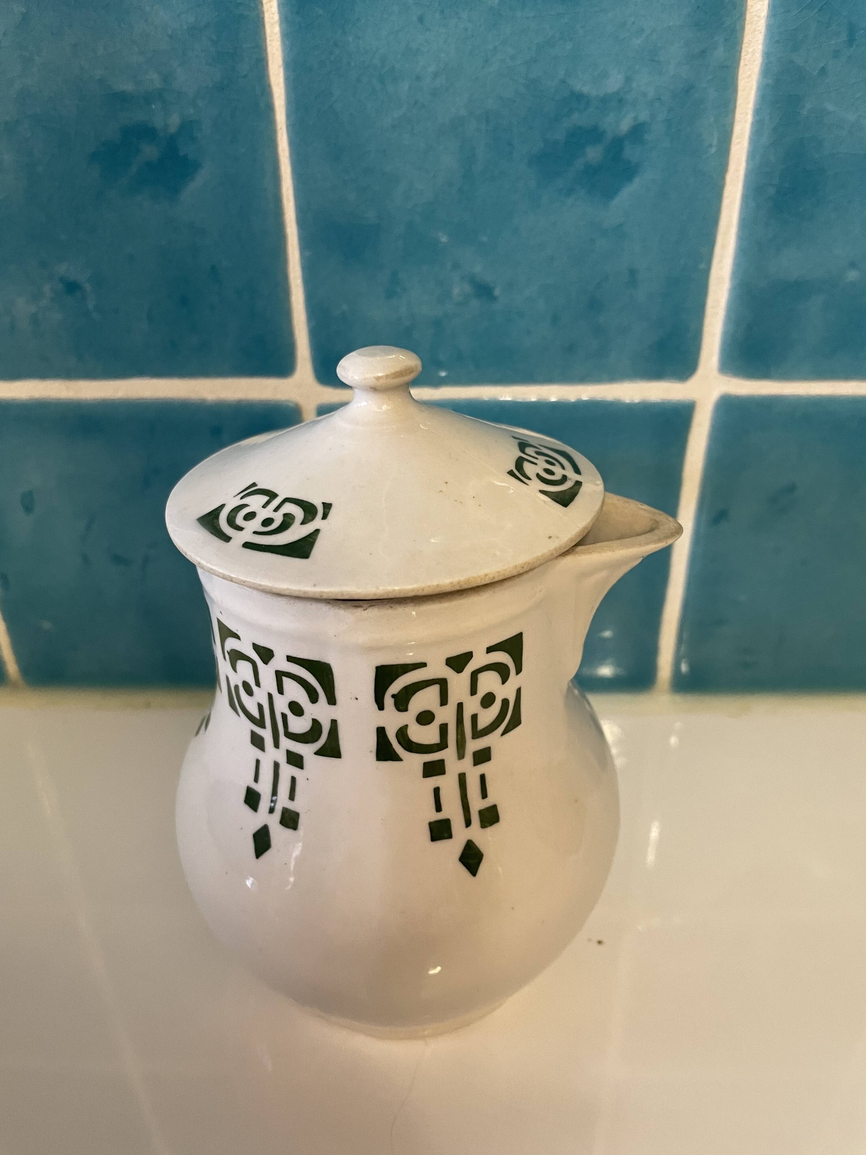 Set of 4 vintage art deco Saint Uze pitchers