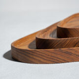 Trio of rounded triangular shaped trays or cups in monoxyl teak