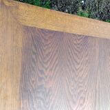 Vintage oak table with tapered legs.