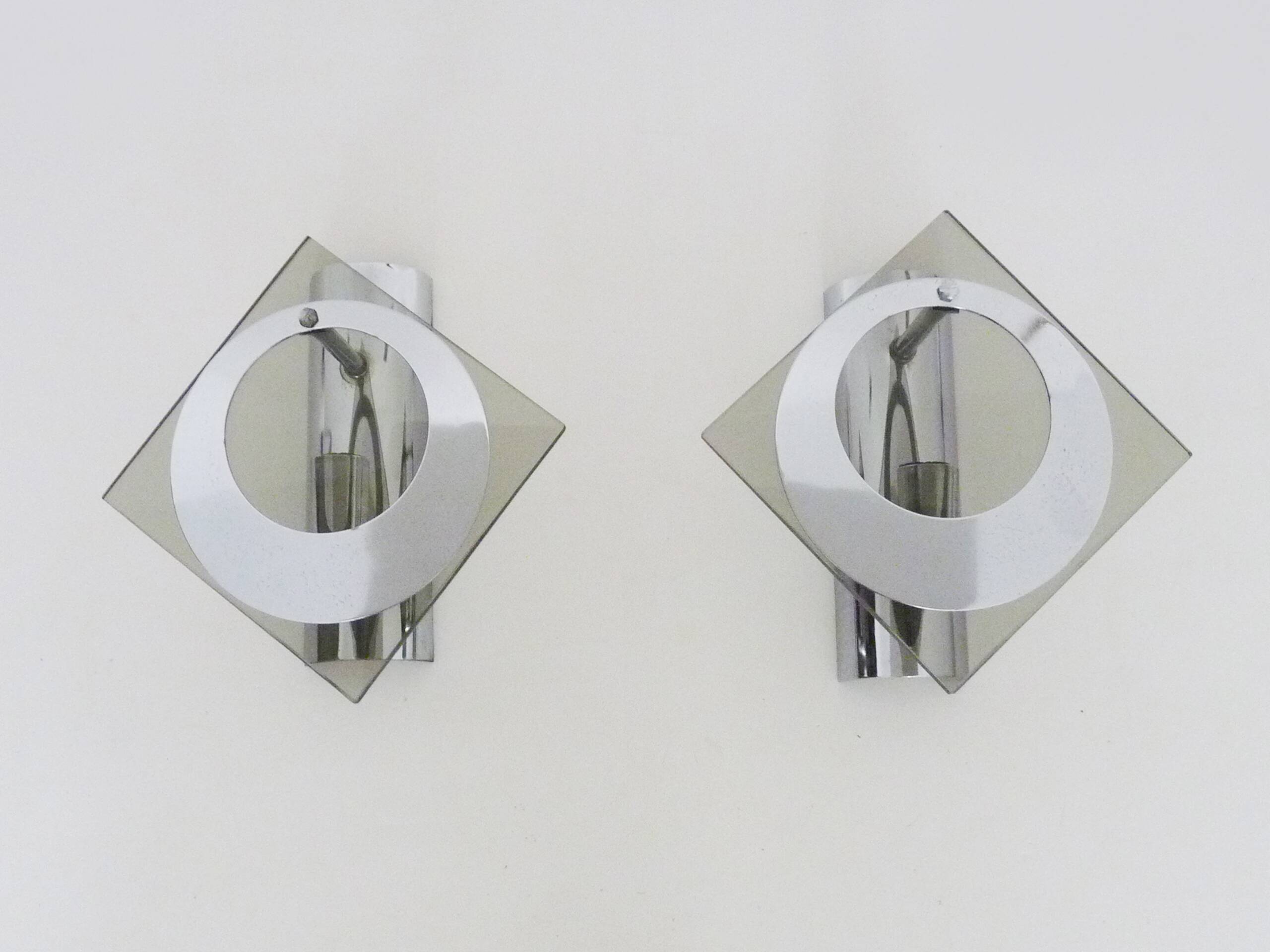 Pair of chrome metal and glass wall sconces, VECA Fontana Arte style.