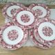 Lot de 6 assiettes plates vintage "RIvanel Made in France" en opaline décor régence rouge bordeaux