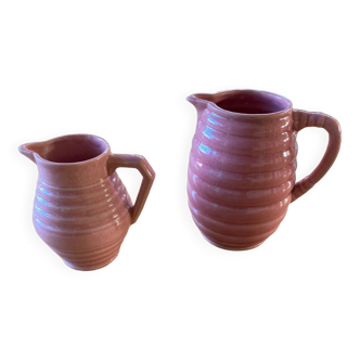 2 pink ceramic milk jugs