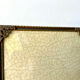 Metal frame in gold colored brass