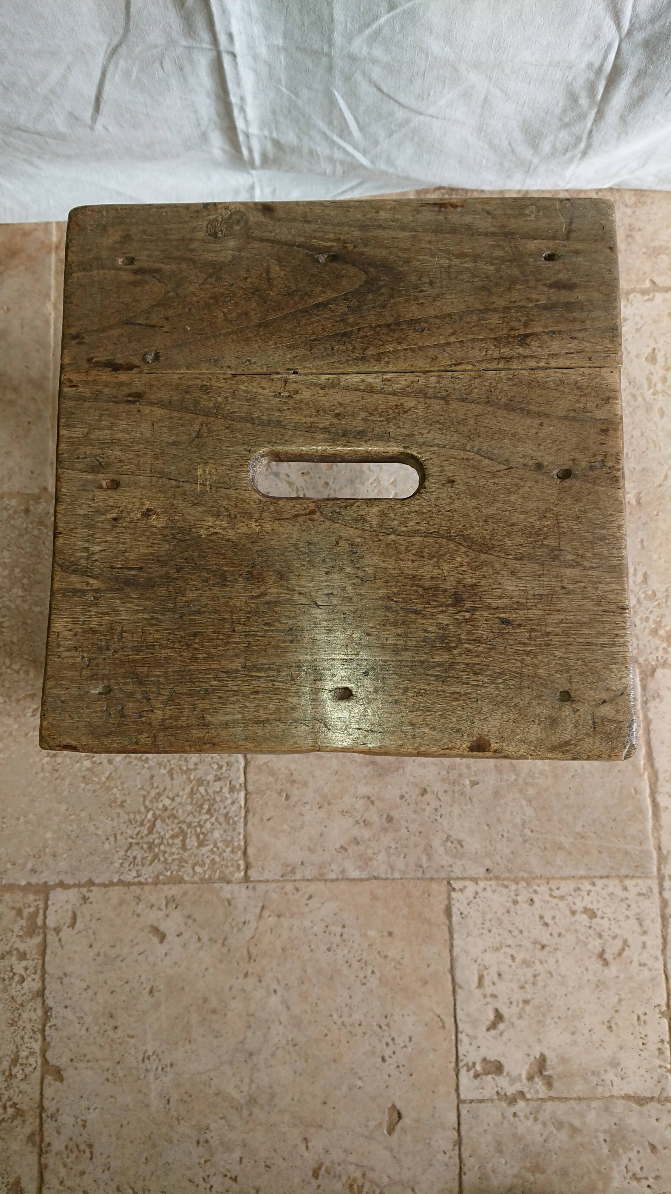 Raw wooden workshop stool