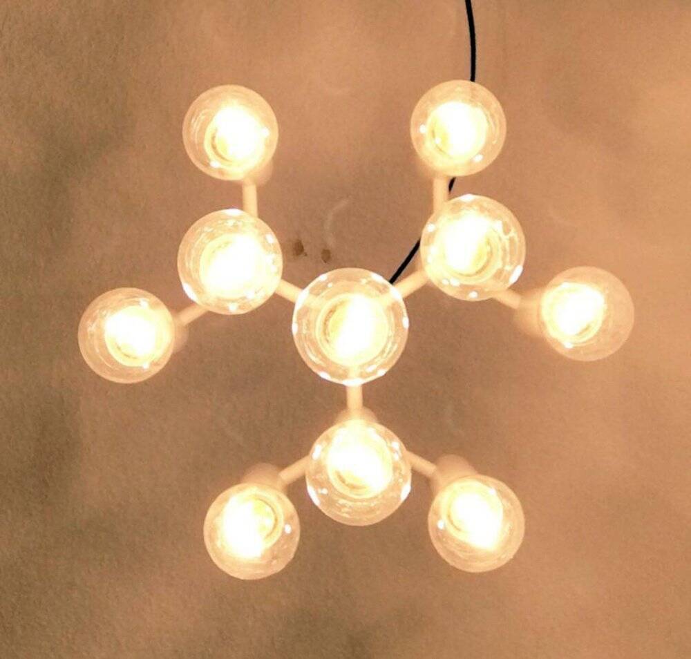 Minimalist suspension from the Swiss space age of the mid-century type 415 by Temde, 1960s.