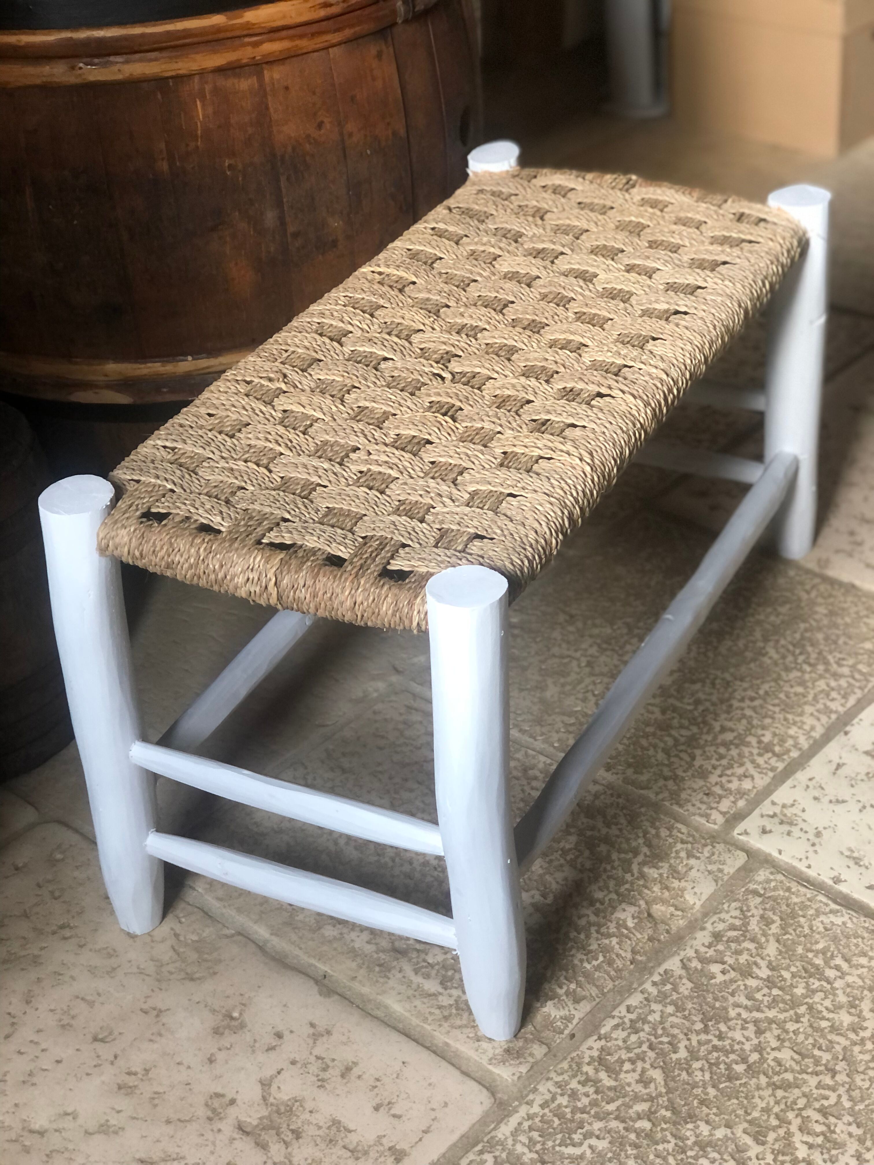 Wooden bench and rope