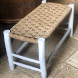 Wooden bench and rope