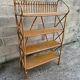 vintage rattan shelf on stand