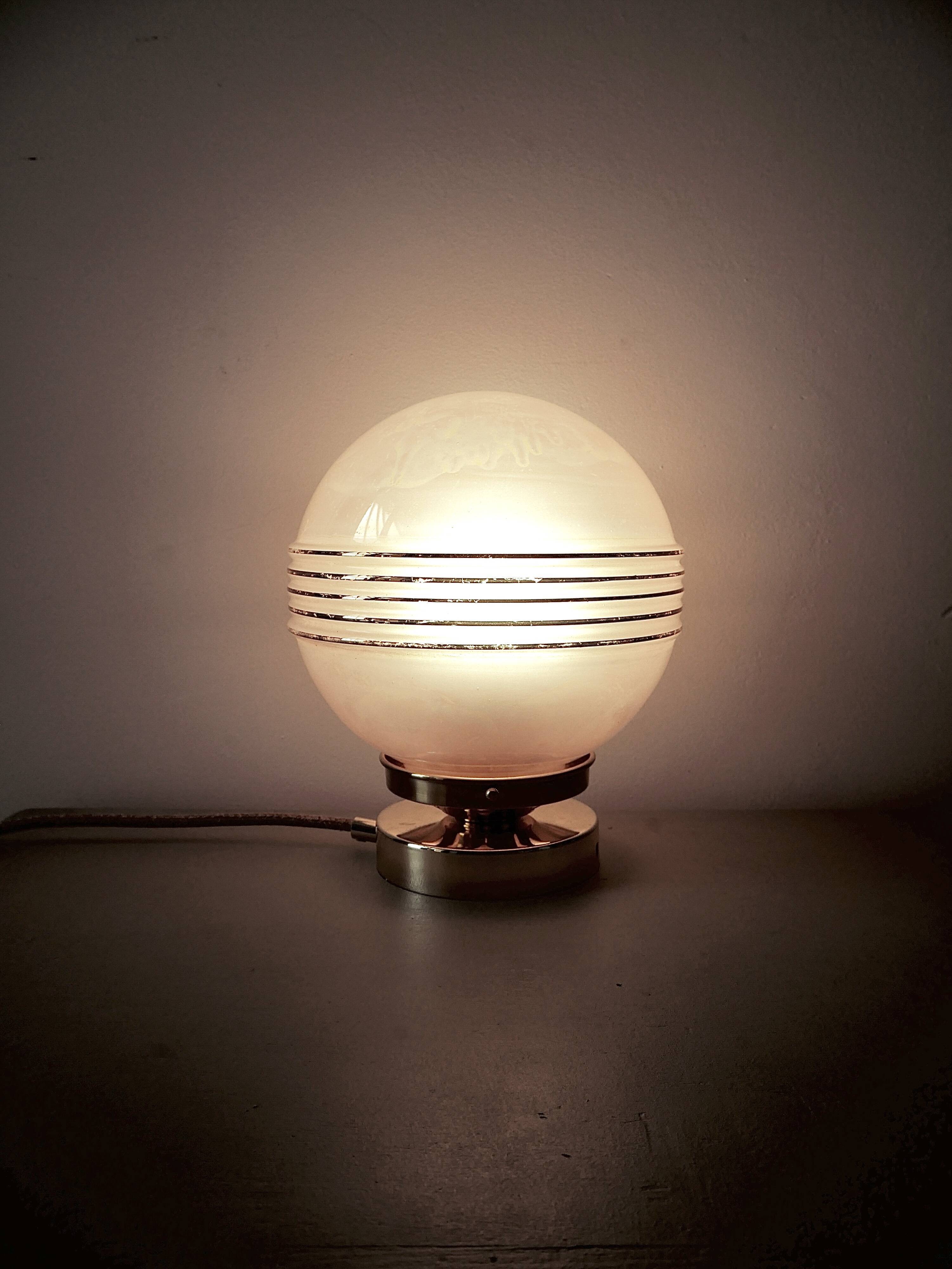 Pink iridescent glass lay lamp