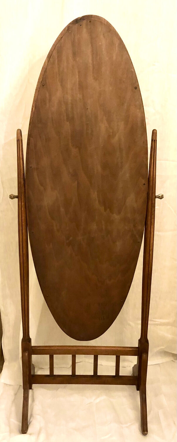 Old large psychic mirror on wooden stand