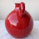 Red ceramic pitcher
