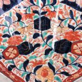 Imari porcelain dish from Japan in the shape of a scallop shell Blue, red and turquoise