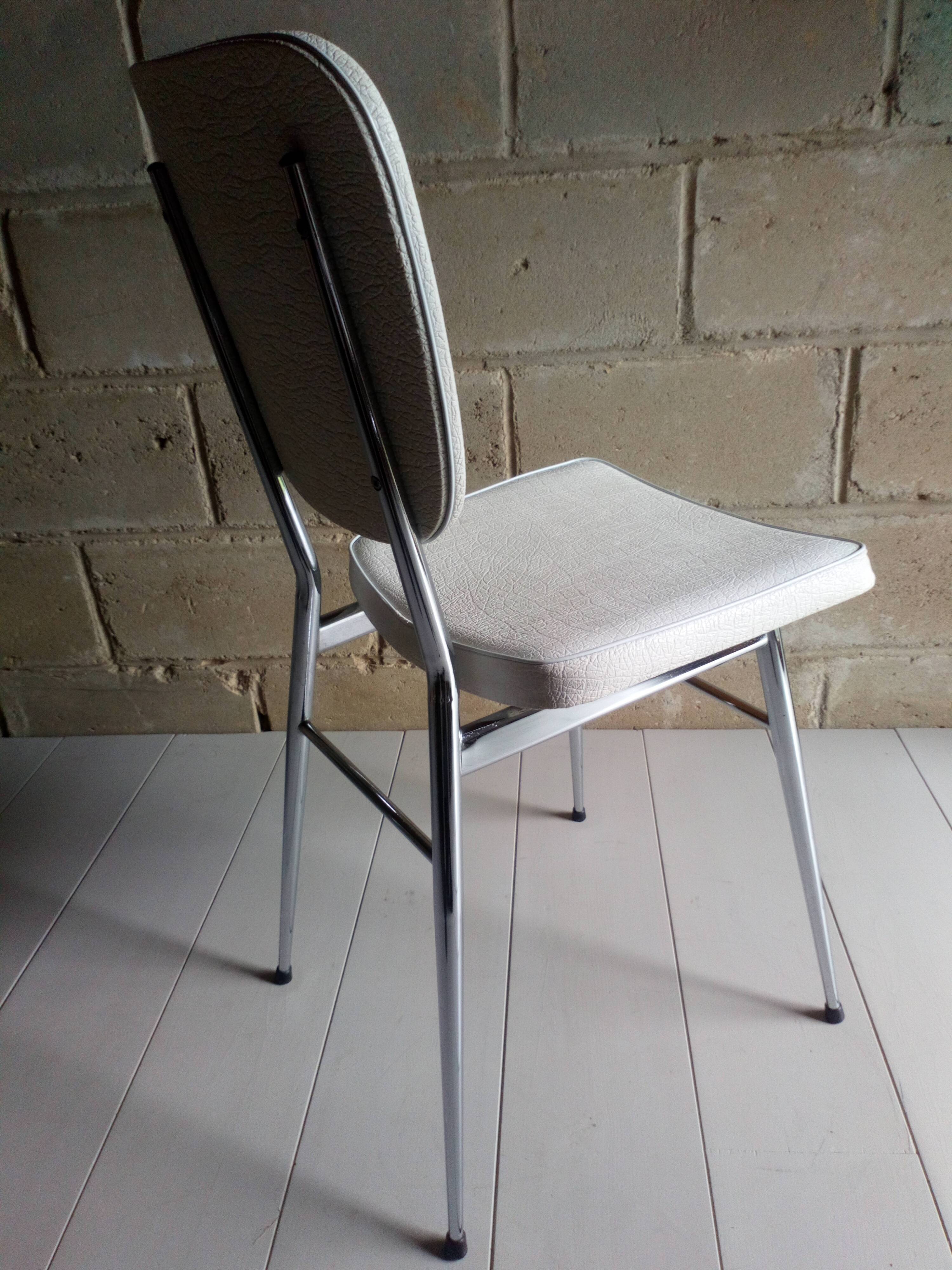 Pair of chrome and white 1960 skaï chairs