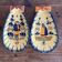 Shell-shaped butter dishes by Henriot Quimper for placing or hanging.