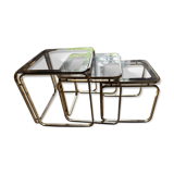 Brass nesting tables with smoked glass tops