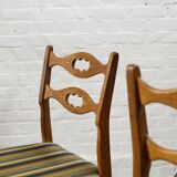 Set of four oak and wool dining room chairs by Henning Kjaernulf, 1960's