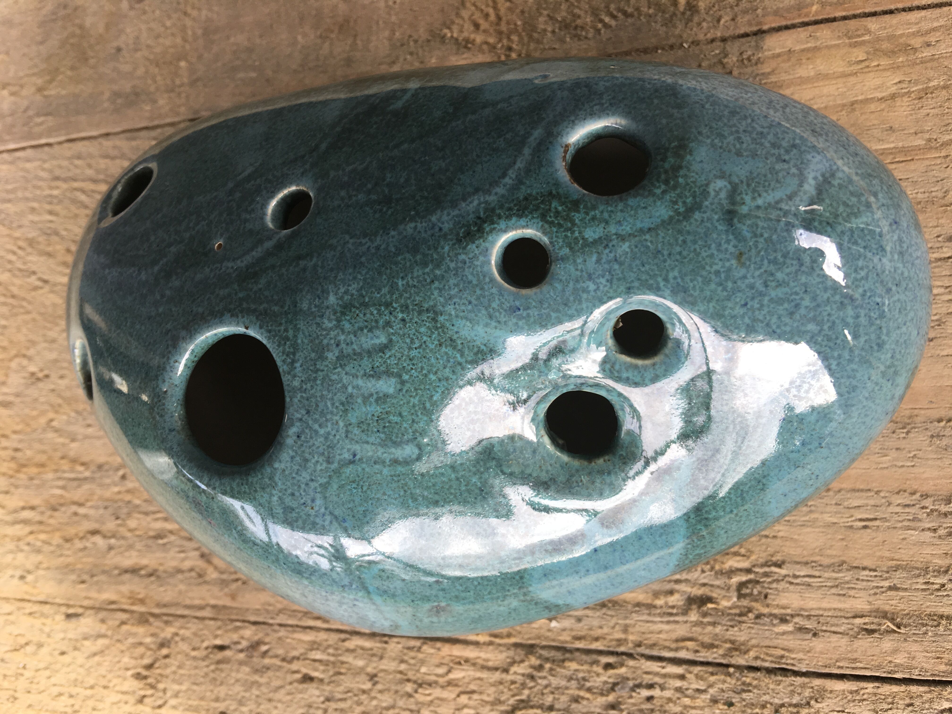 Roller spike flowers, blue-green ceramics