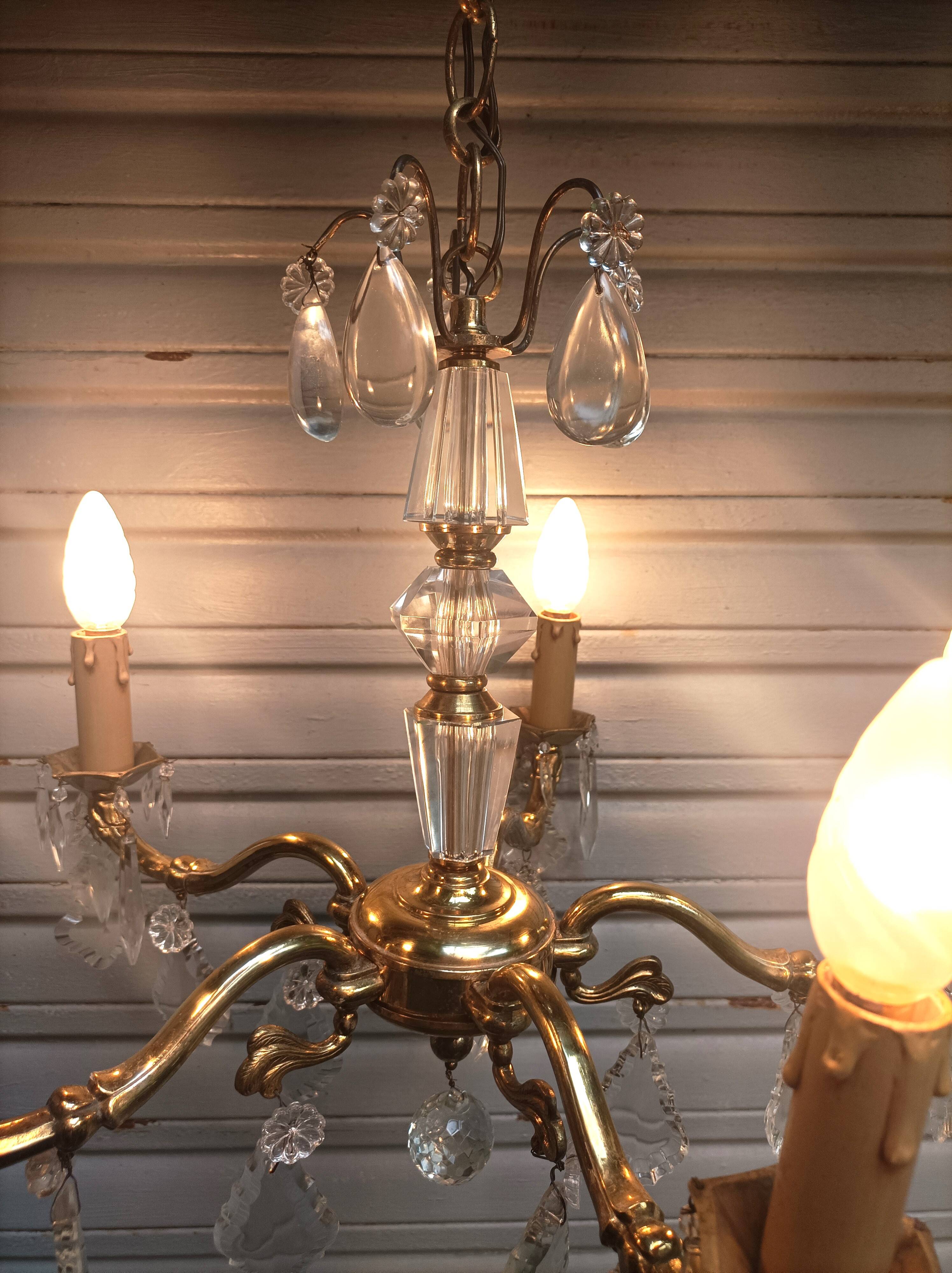 Exceptional bronze chandelier with crystal pendants in working order circa 1910