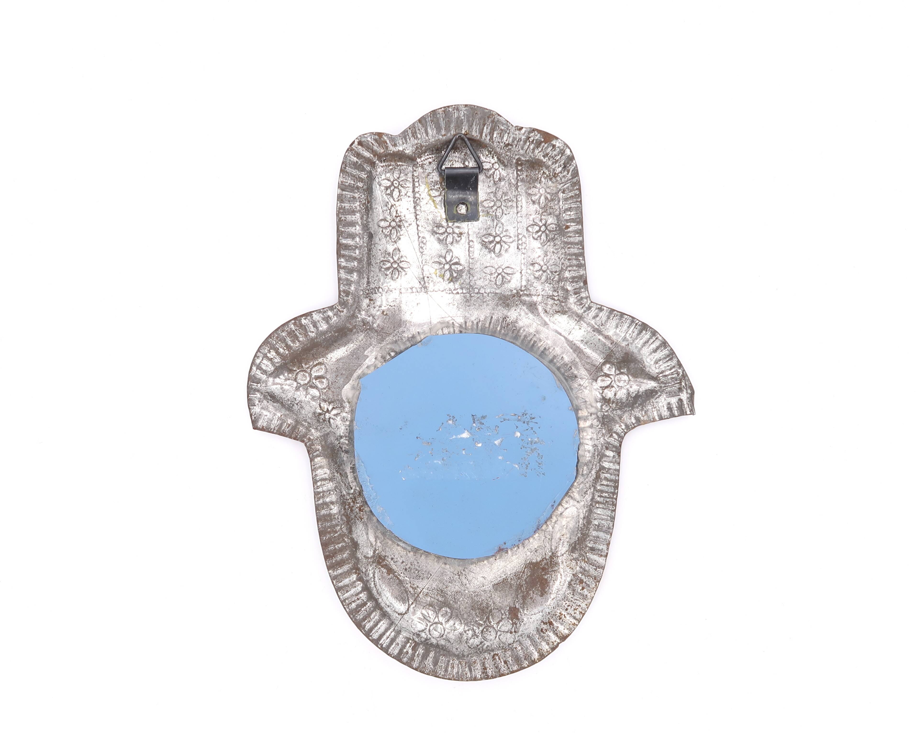 Moroccan metal mirror in the shape of a hand, 1970s