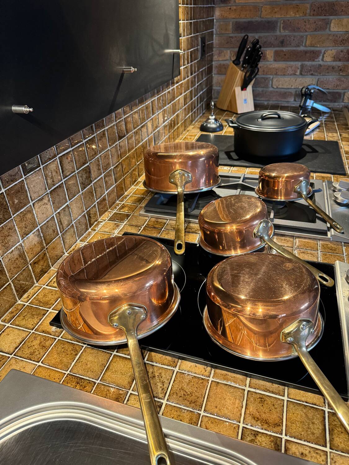 Set of 5 copper saucepans