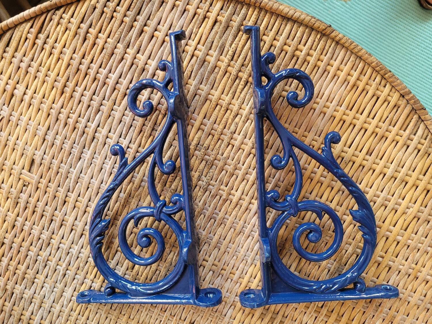 Pair of blue wrought iron shelf brackets
