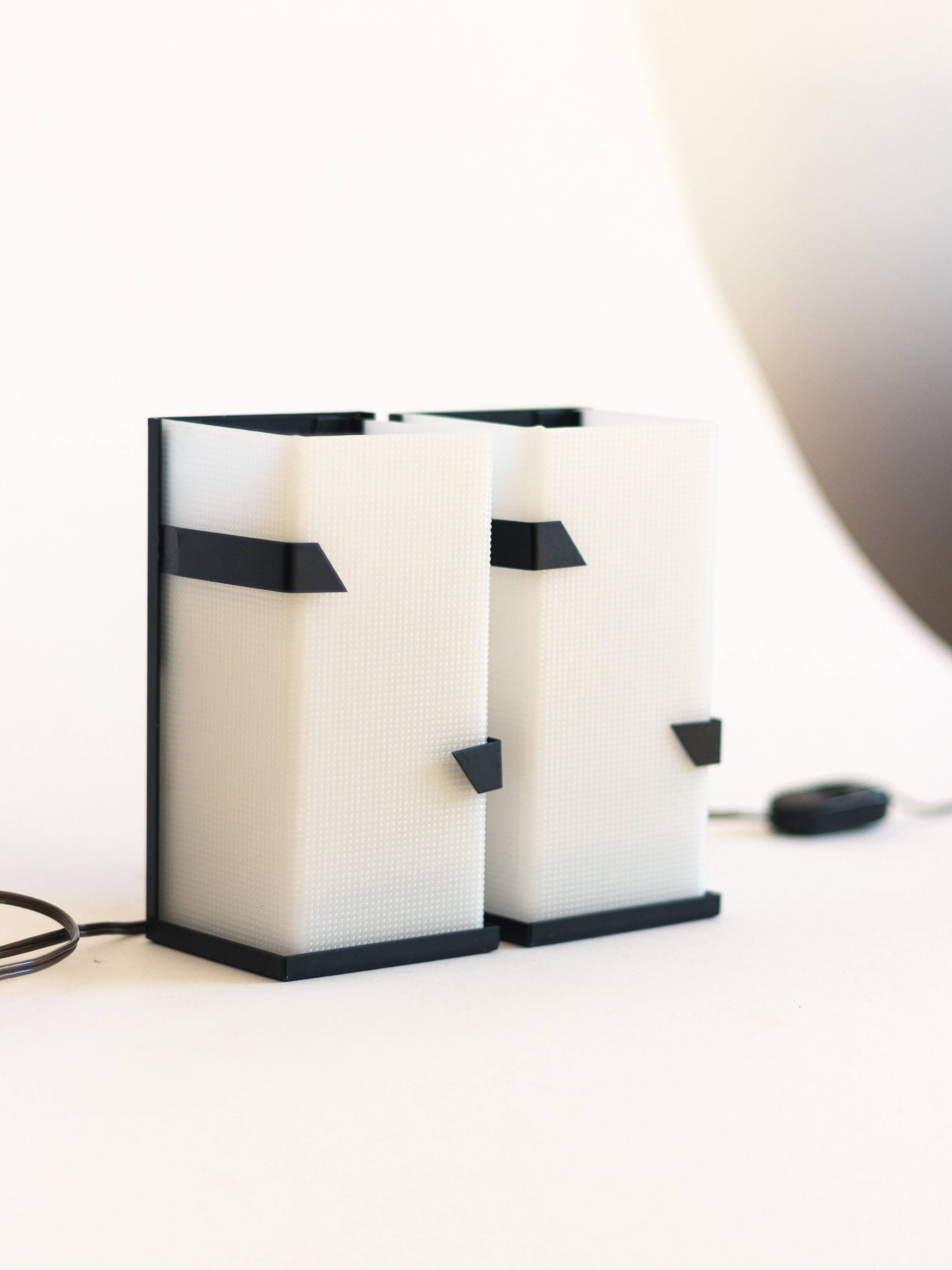 Pair of modernist metal wall lights with perspex diffuser, 1950s/1960s