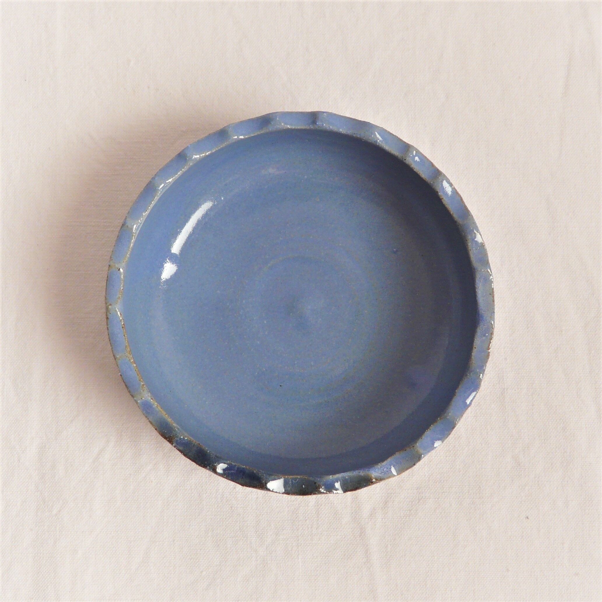 Blue enamelled ceramic cup