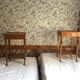 Pair of empire style swan neck beds and bedside tables