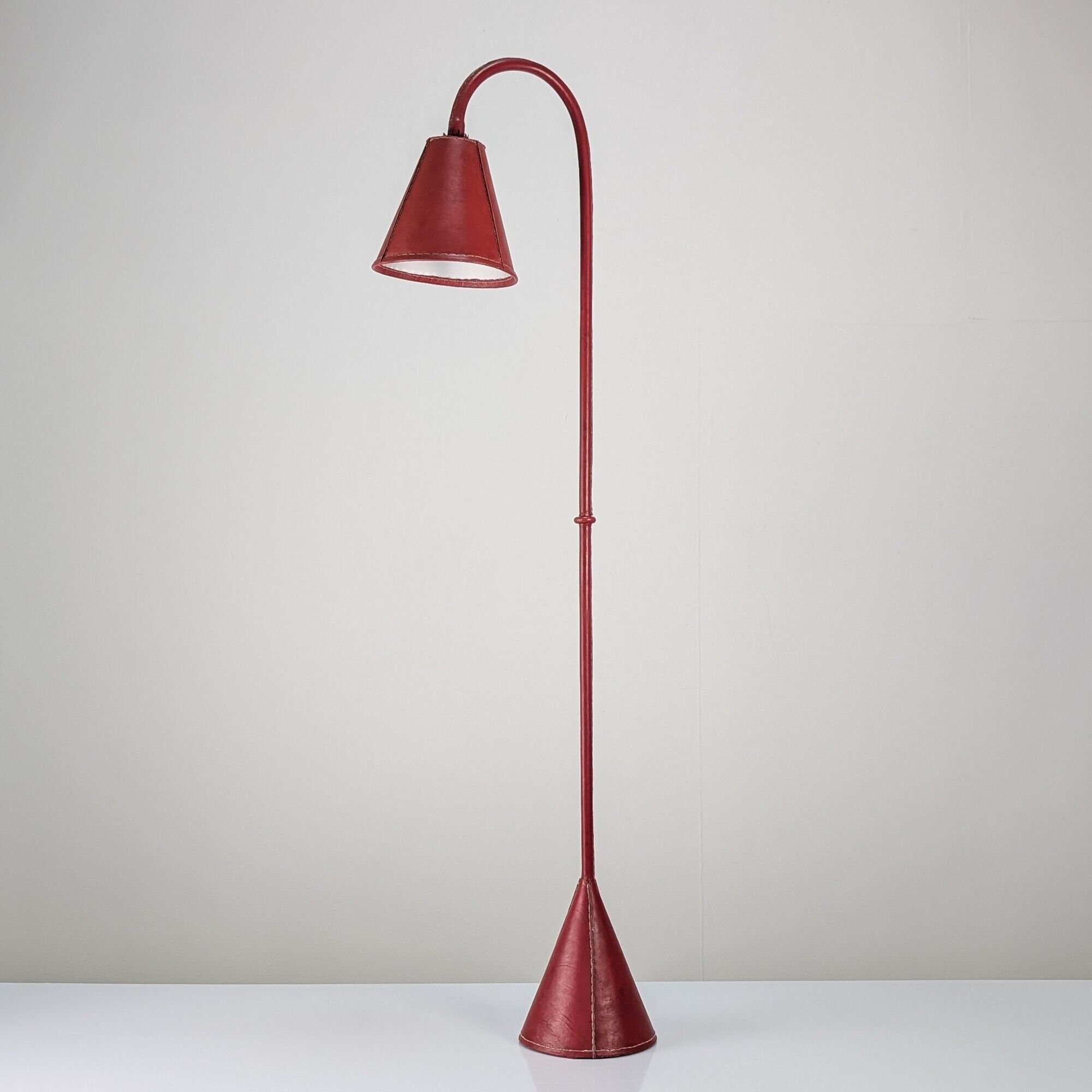 Jacques Adnet floor lamp in red leather, mid-century modern, France, 1960s