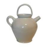 Old jug chevrette gargoulette in varnished white sandstone