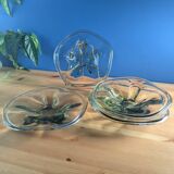 4 wavy glass bowls plates in smoky green design, signed and numbered