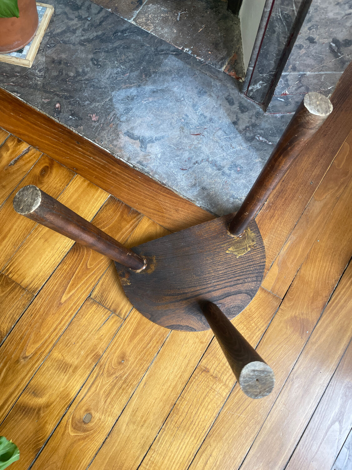 Dark wood tripod stool