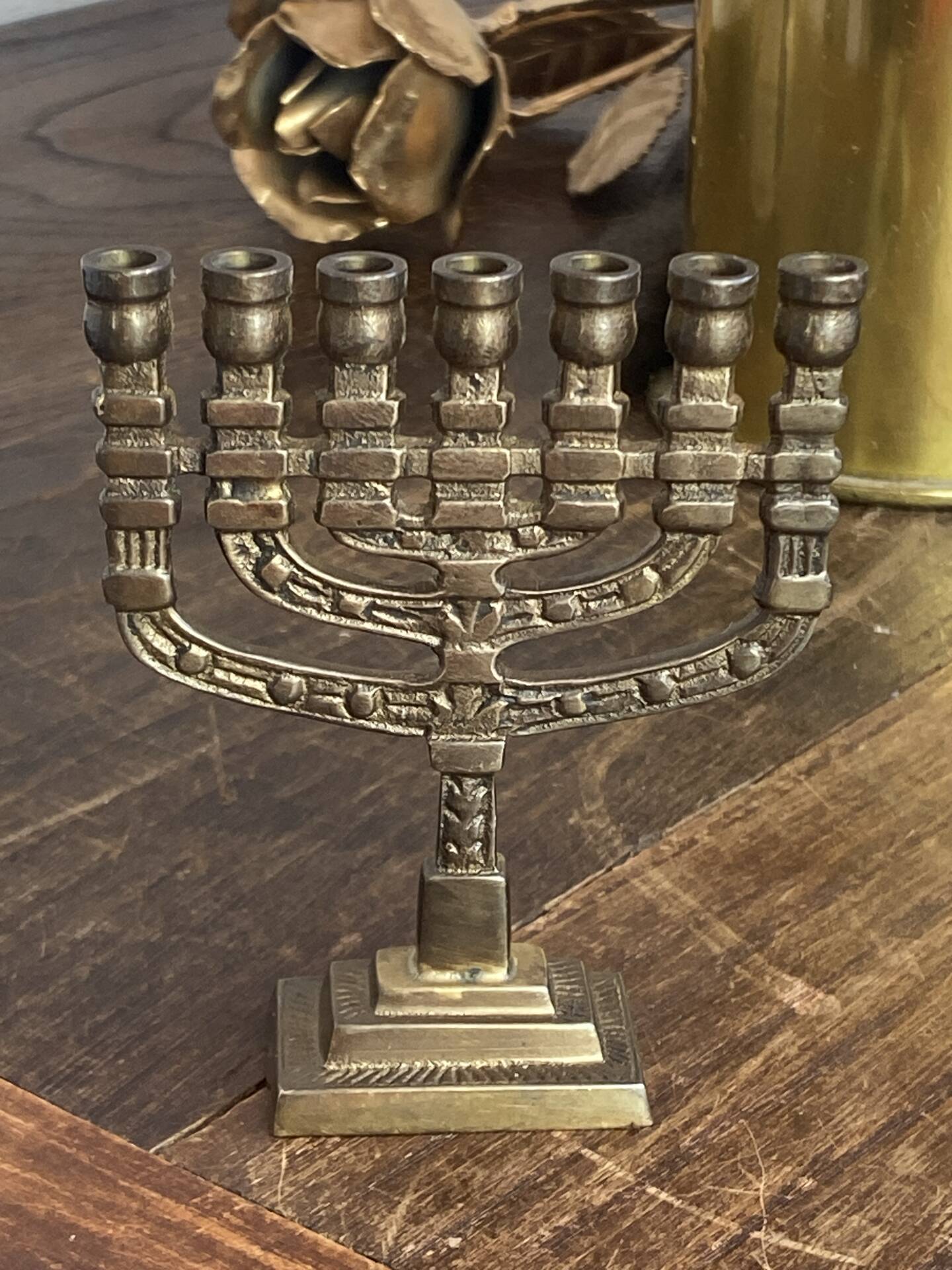 Chandelier, seven-branched menorah, in brass.