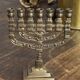 Chandelier, seven-branched menorah, in brass.