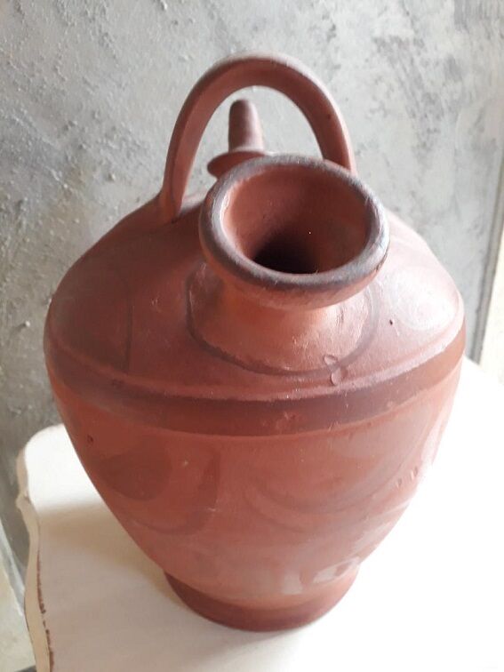 Old jar in terra cotta