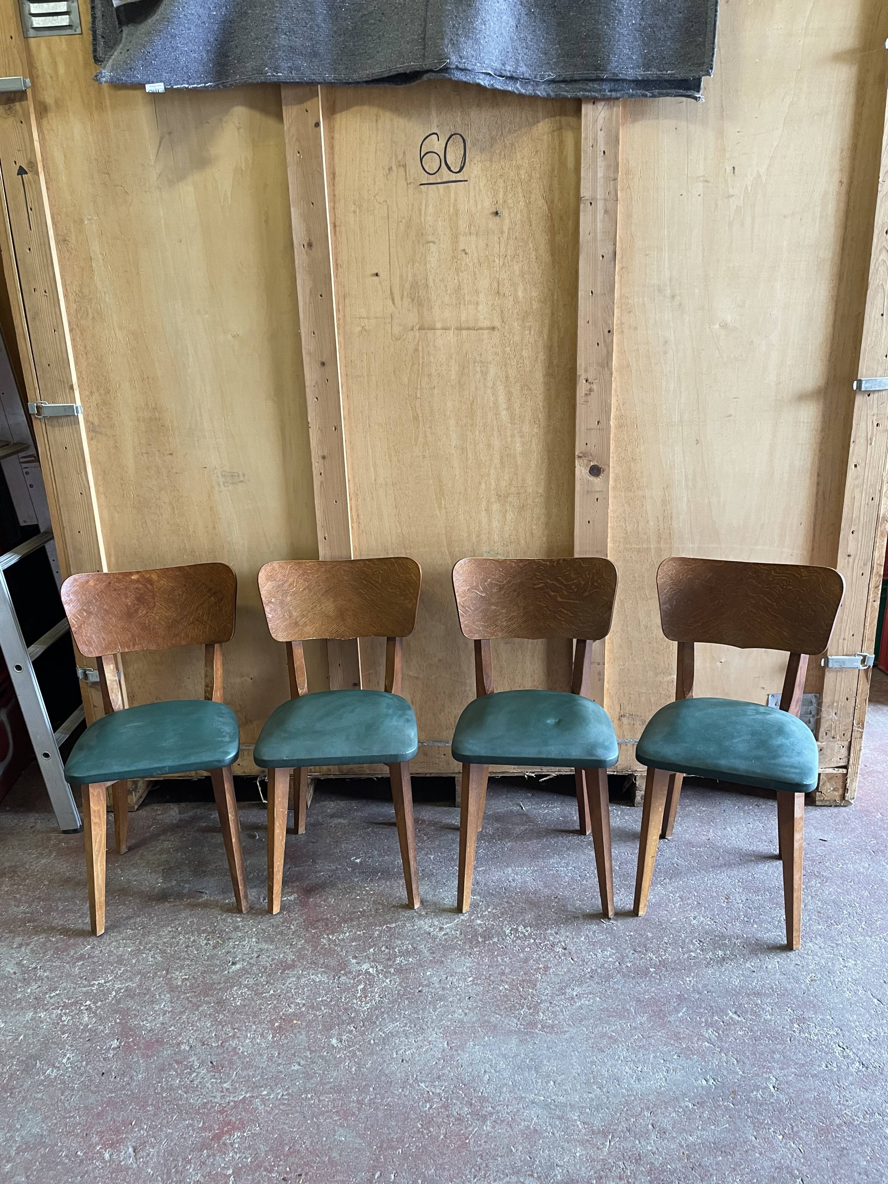 Ensemble de 4 chaises estampillées elf