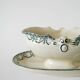 Sauce boat in Salins Iron Earth, "Guirlandes" model, textured version, early 20th century