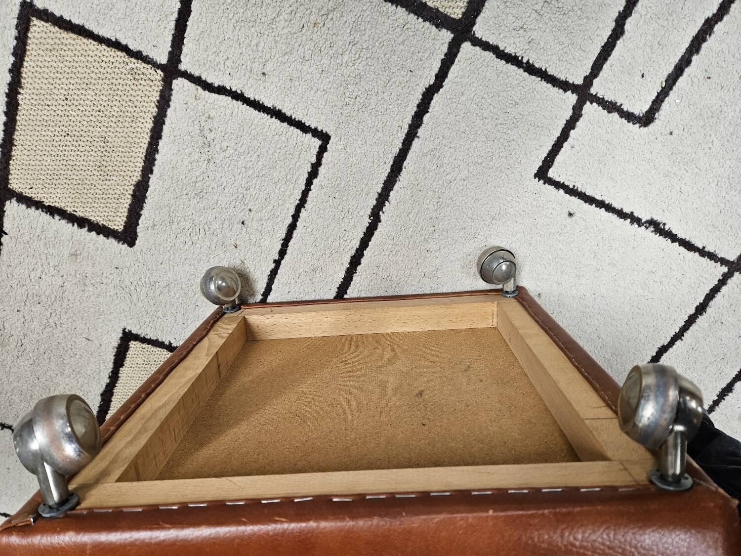 Ottoman chest pouf 1960 leather on vintage casters