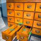 Double-sided wooden industrial filing cabinet with 48 vintage drawers