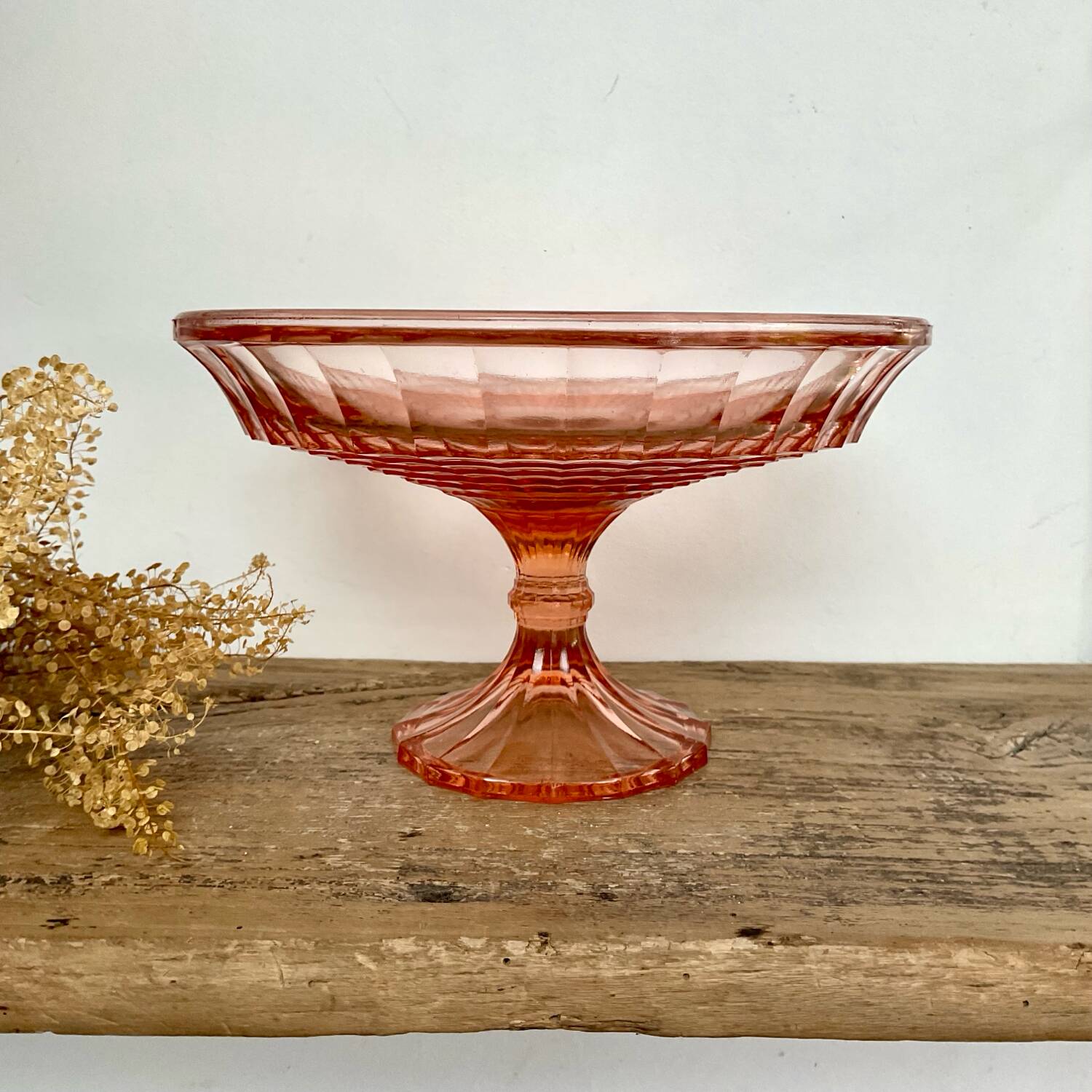 Pink glass cup, fruit bowl
