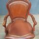 Louis XV style armchair covered in leather.