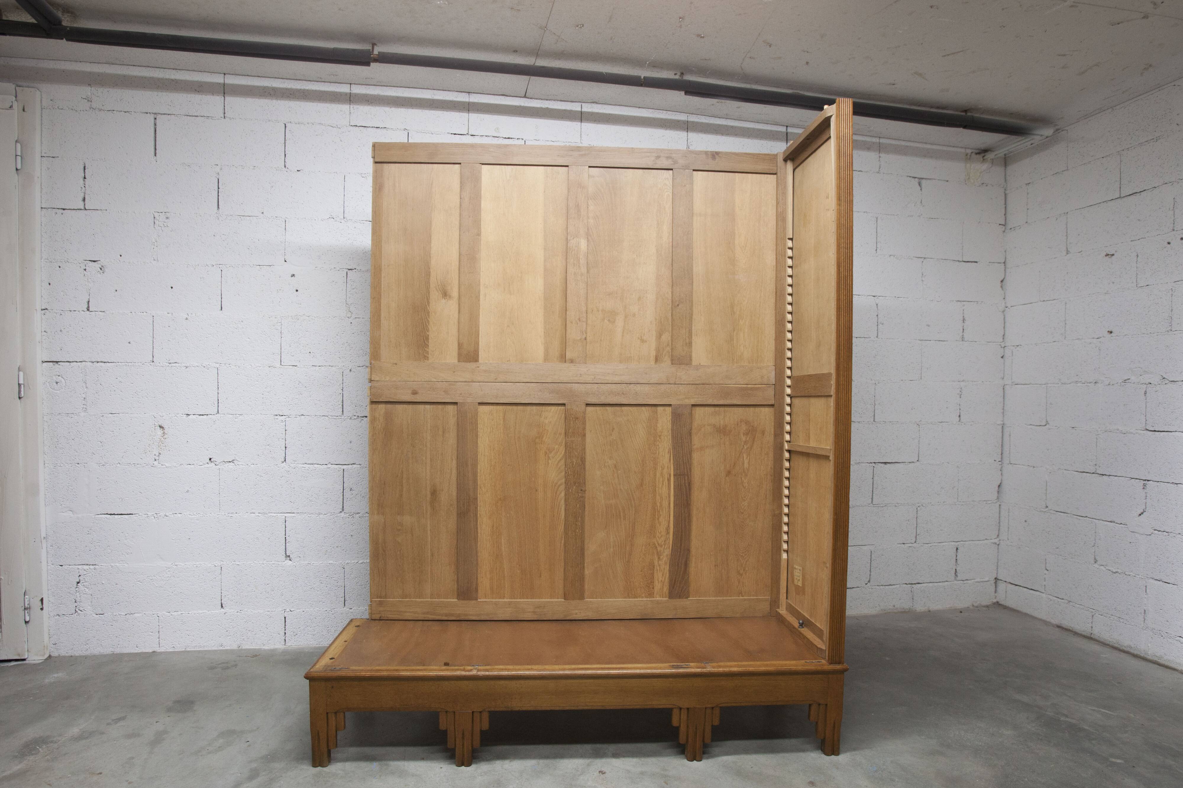 Art Deco carved oak wardrobe - Flemish workshop circa 1930