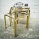 Trio of gilded metal trundle tables