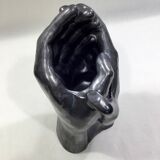Vase with intertwined hands