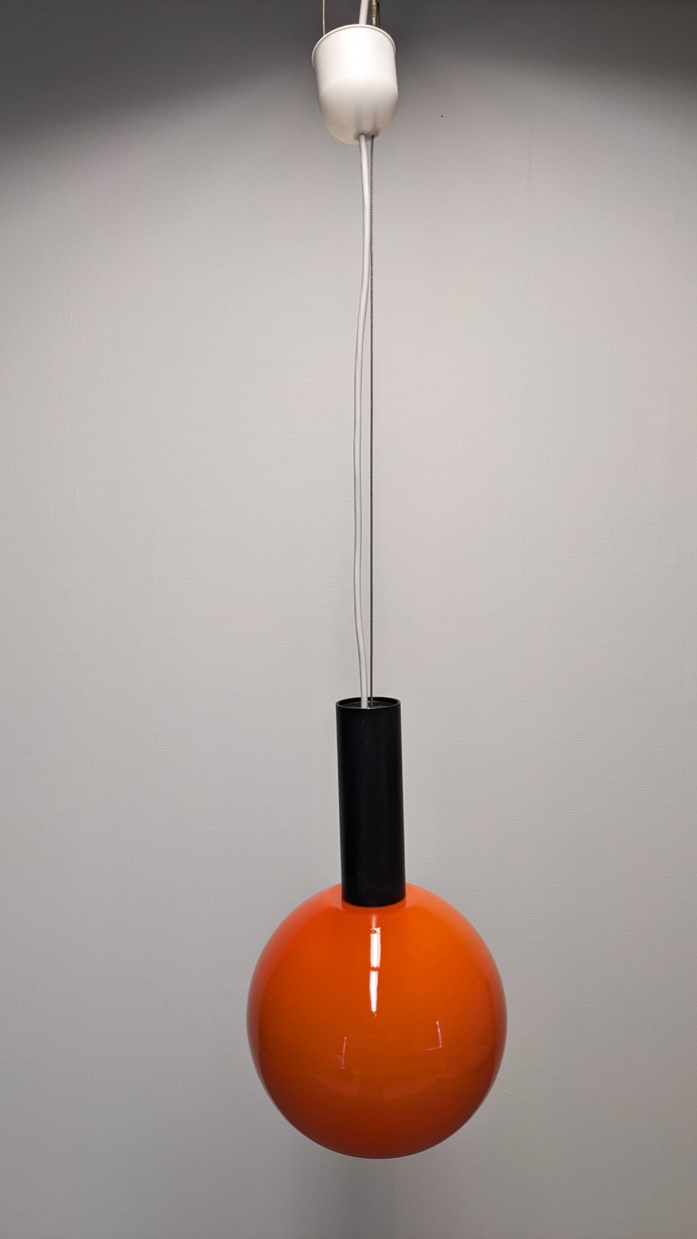 Pair of orange opaline ball pendants by Parscot, France circa 1970