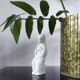 Vintage white plaster statuette of the Virgin Mary.