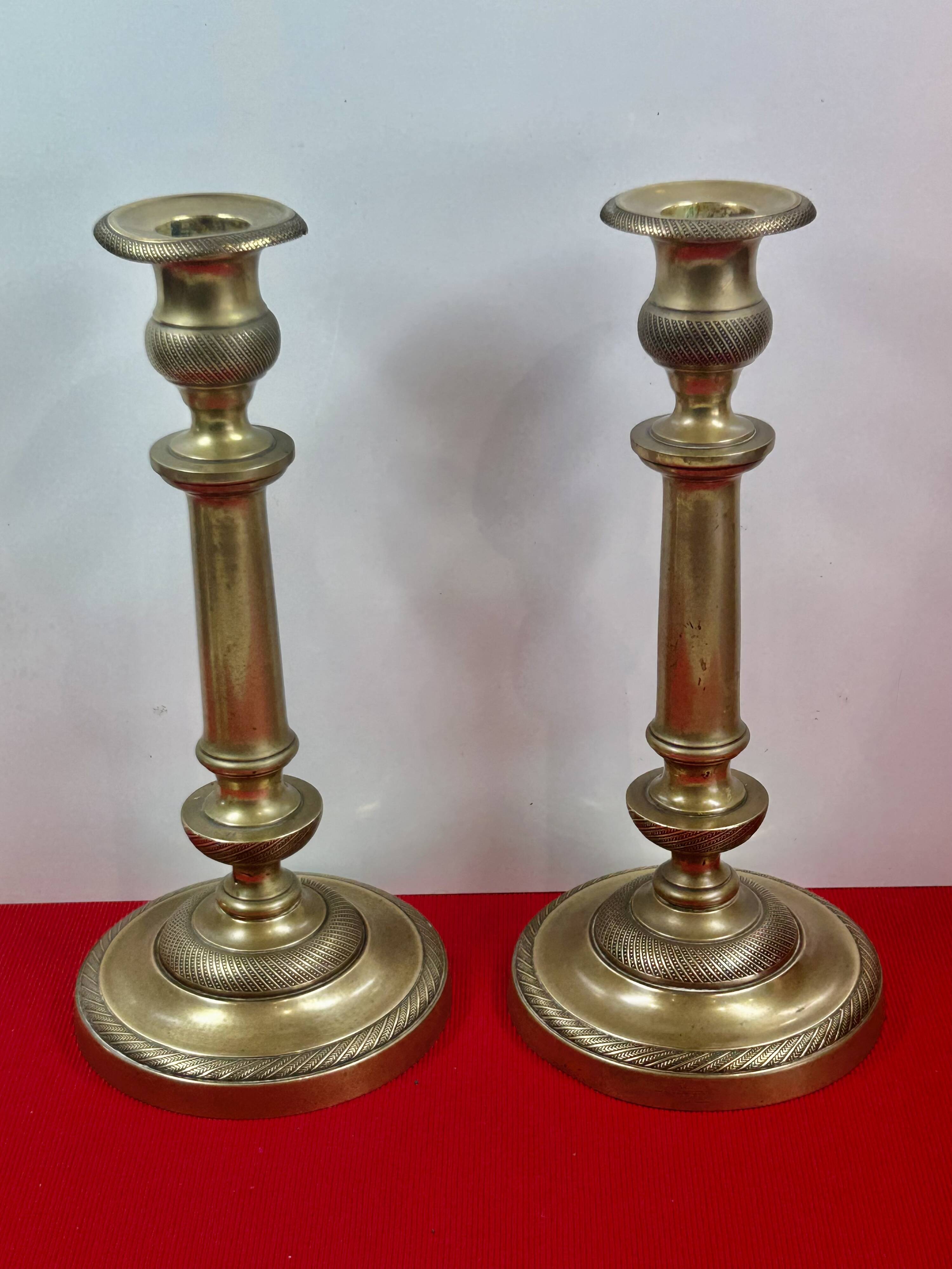 Pair of 19th-century restoration candlesticks in guilloché bronze - H 27 cm