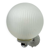 Old wall lamp in enameled metal and vintage globe glass decoration