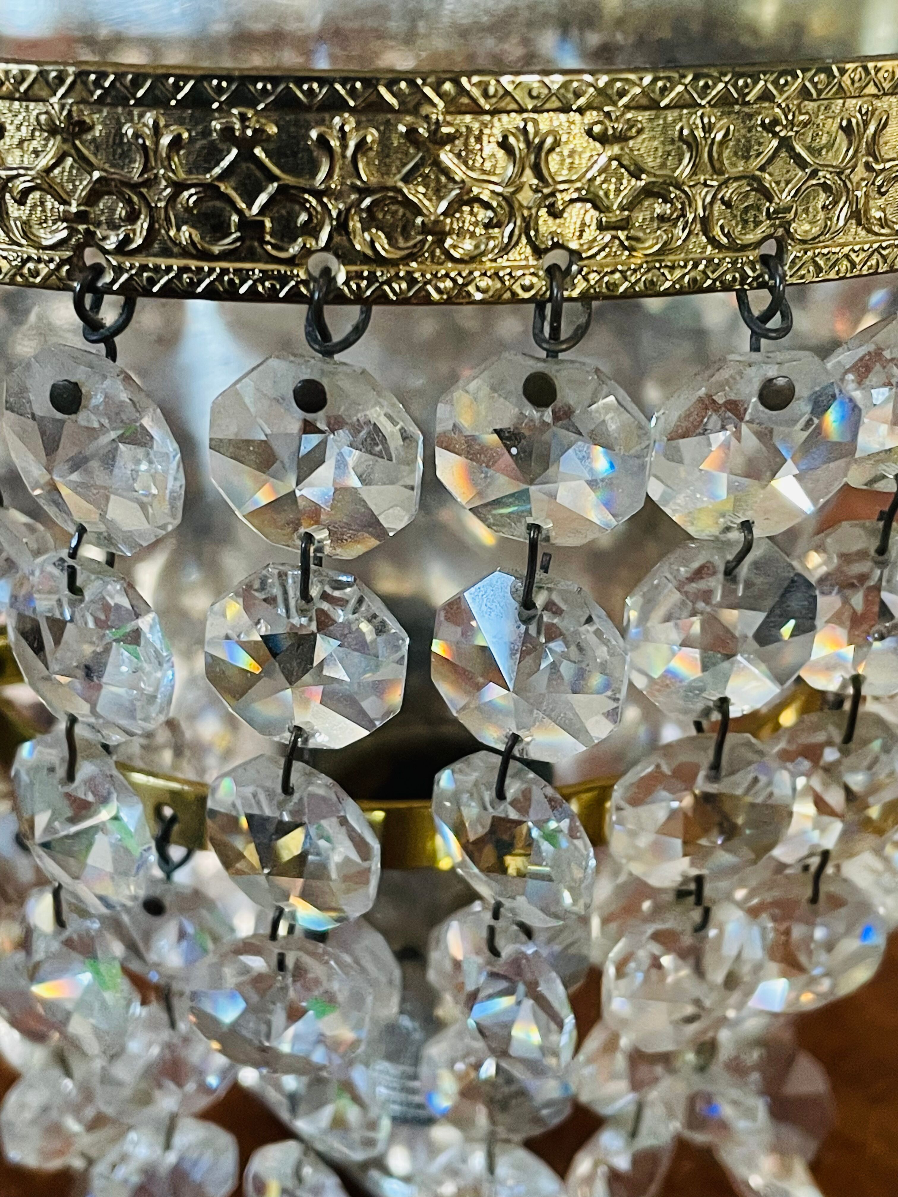 Pair of brass sconces and tassels