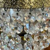 Pair of brass sconces and tassels